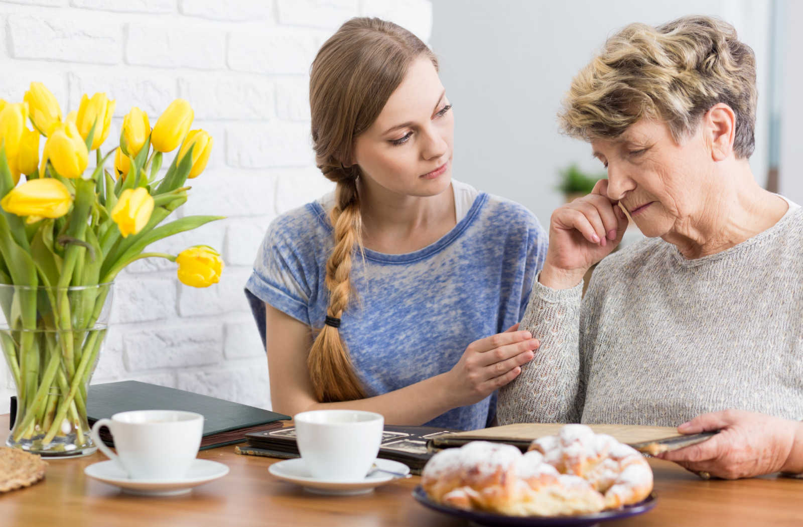 A young woman talking with her grandma
